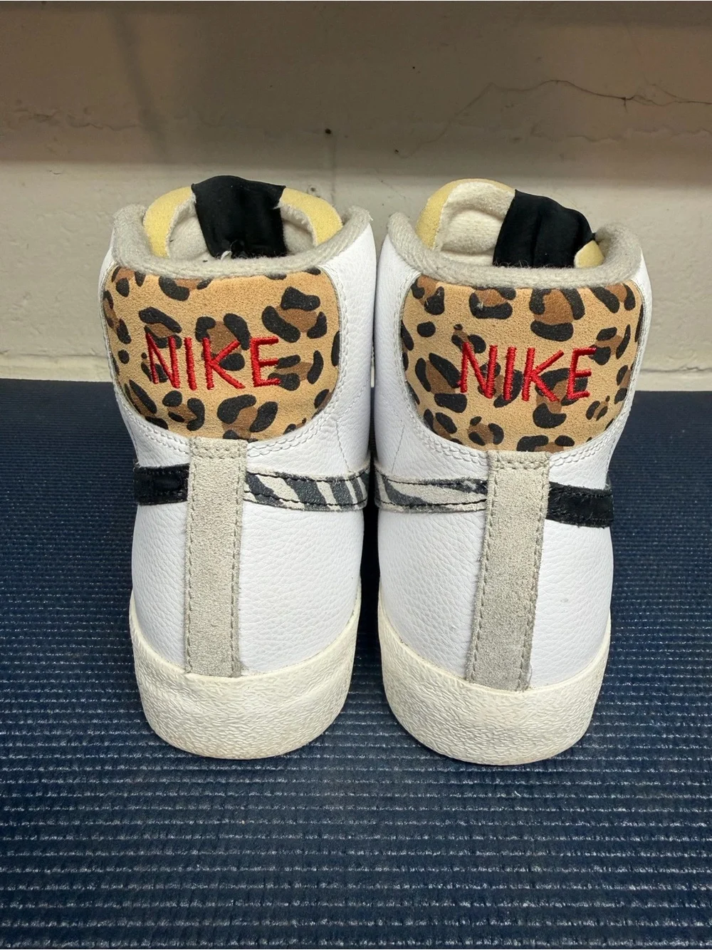 Nike White and Black mid-Top Sneakers with Animal-Print Accents